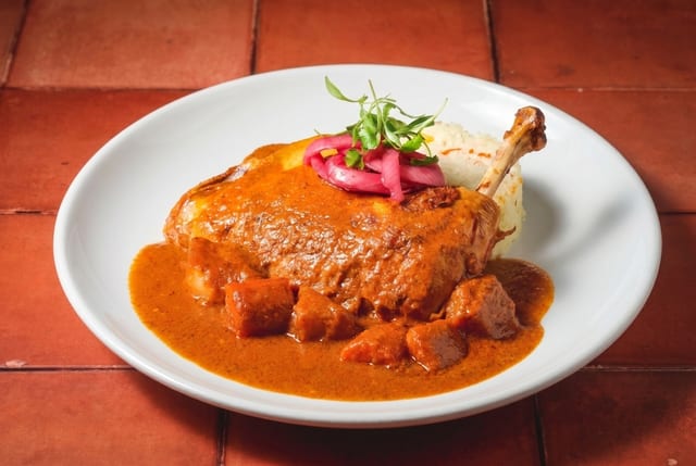 Pollo Guisado.