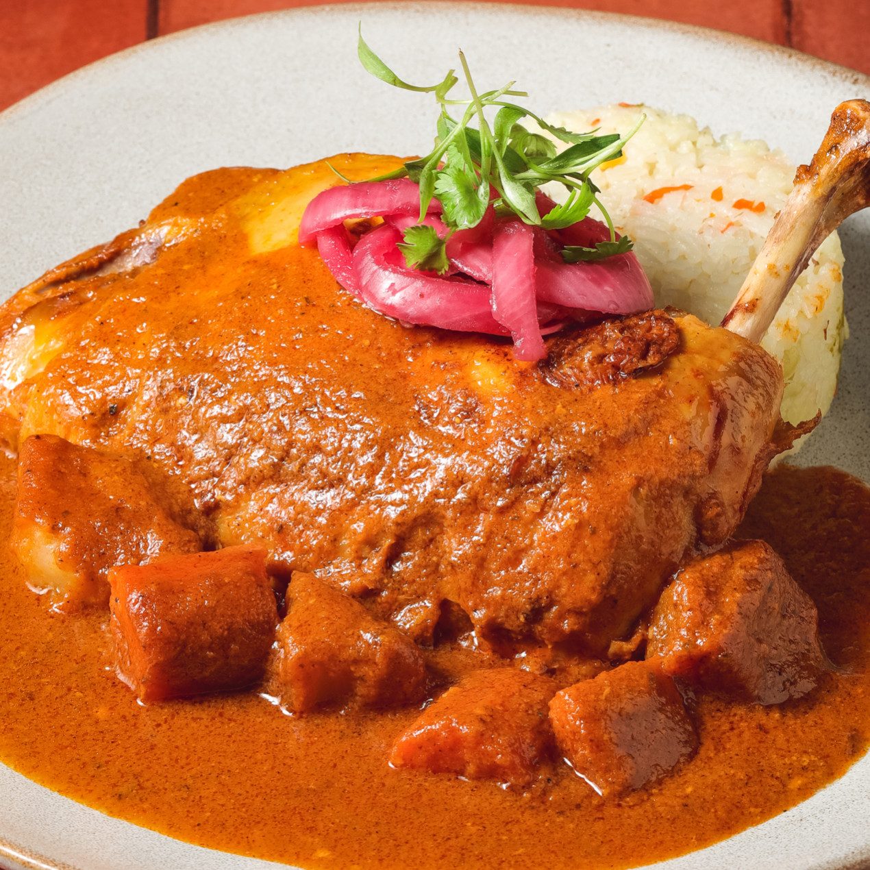Pollo Guisado.